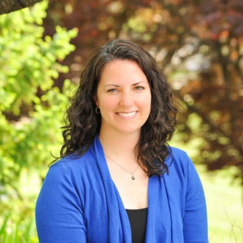 A head shot of Eating Disorder Dietitian, Jessica Ward, in a blue cardigan in her home state of Indiana